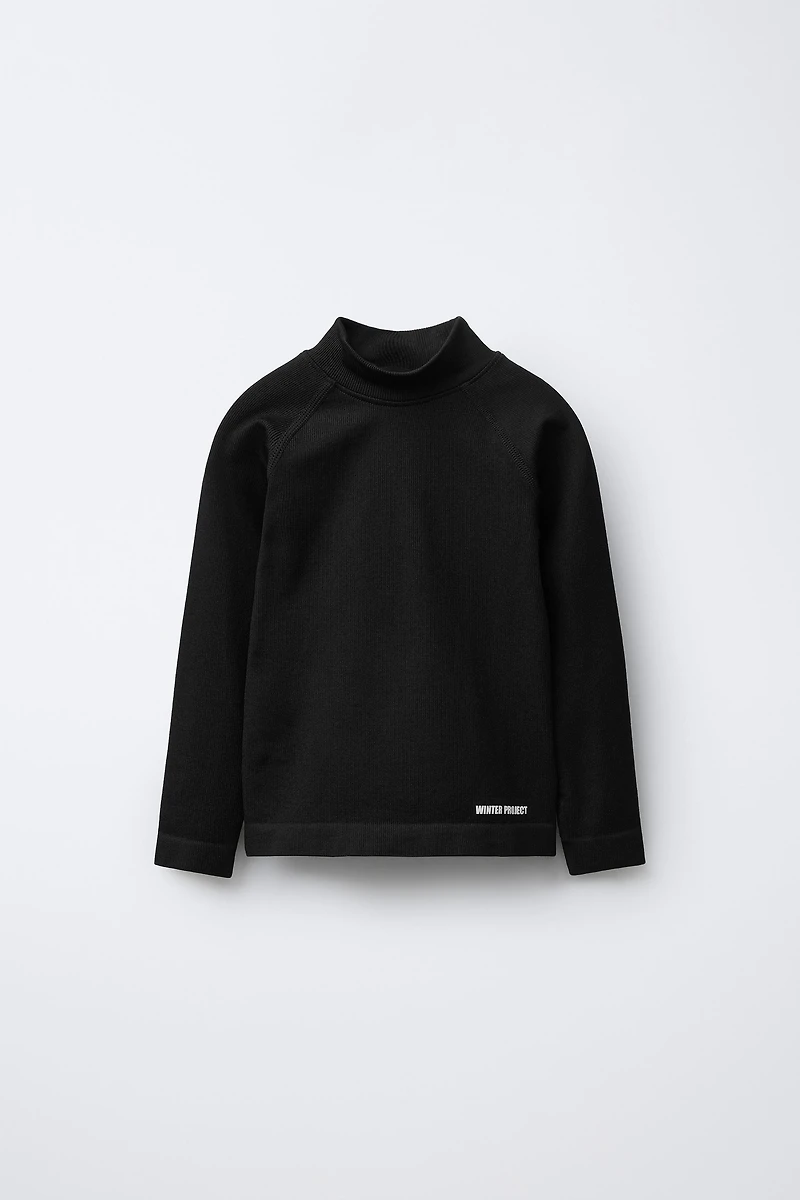 T-SHIRT CÔTELÉ À INSCRIPTION EN RELIEF