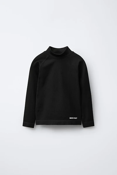 T-SHIRT CÔTELÉ À INSCRIPTION EN RELIEF