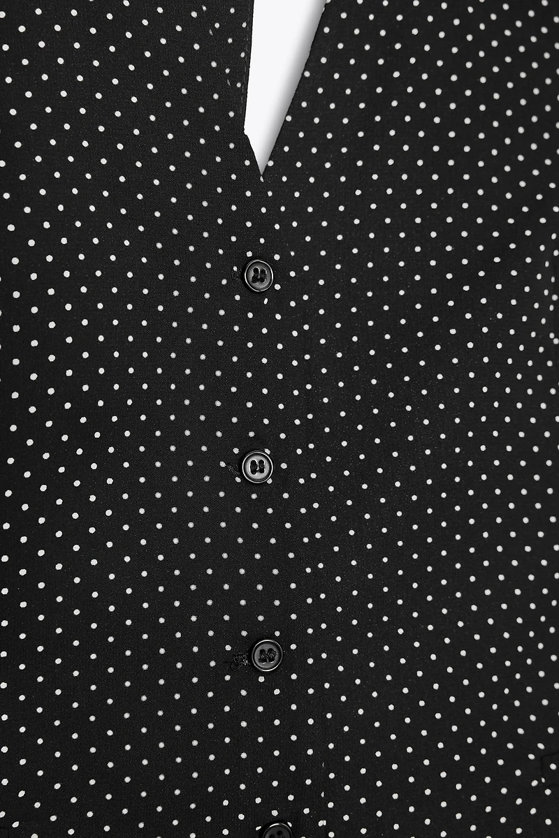 TOP GILET À POIS