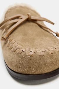 SABOTS EN CUIR EFFET MOUTON