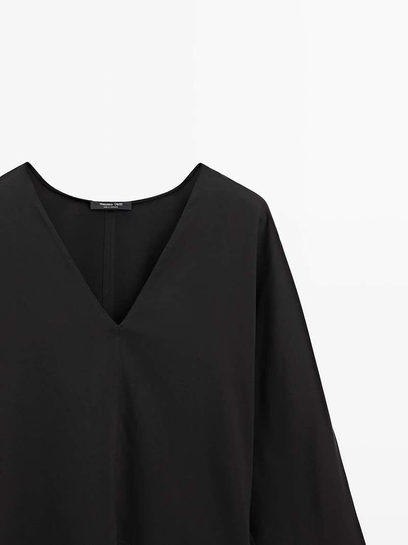 Flowing blouse with V-neckline