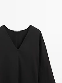 Flowing blouse with V-neckline