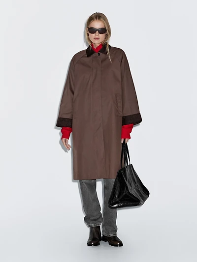 Long waxed parka with corduroy detail