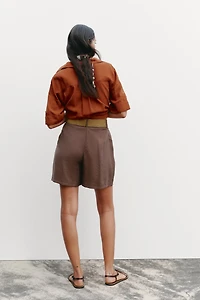 PLEATED BELT SHORTS