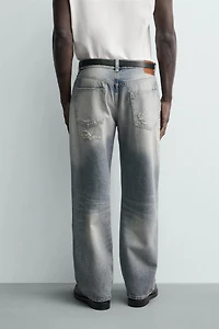 LOOSE FIT RIPPED JEANS