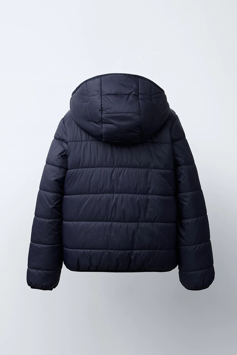 DOUDOUNE ULTRALÉGÈRE À CAPUCHE