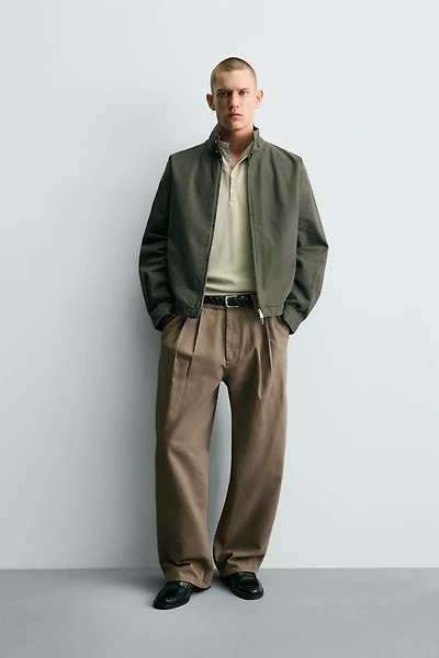 PLEATED BAGGY FIT CHINO PANTS