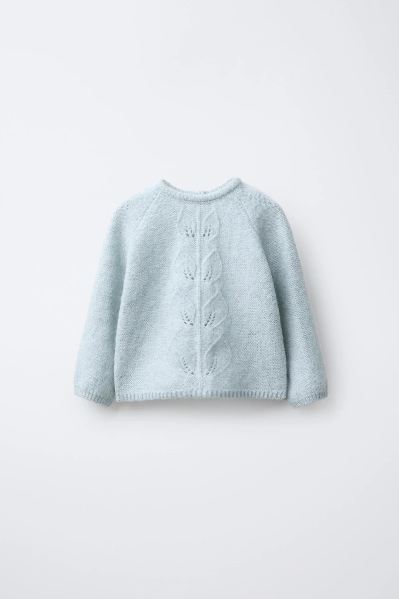 PULL EN MAILLE AVEC FEUILLES