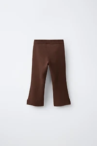 FLARE KNIT PANTS WITH BOWS