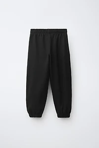 ENSEMBLE EN MOLLETON SWEAT À CAPUCHE ET PANTALON BANDES