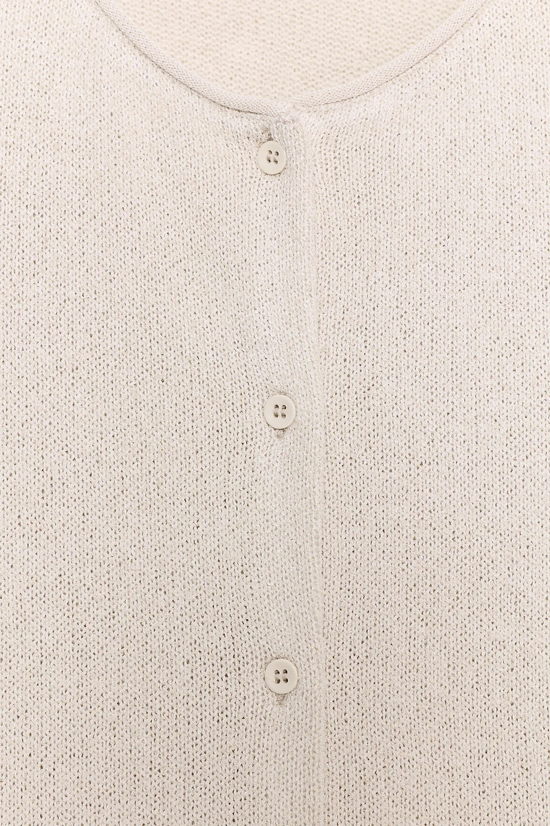 GILET À BOUTONS MANCHES LONGUES