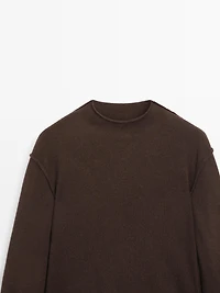 Pull à col montant en maille de laine mélangée