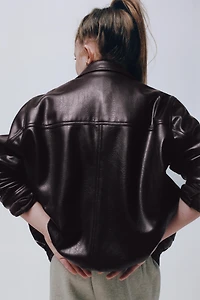 BLOUSON EN MATIÈRE SYNTHÉTIQUE À POCHES