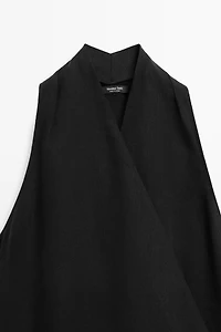 Draped surplice top with corset belt detail