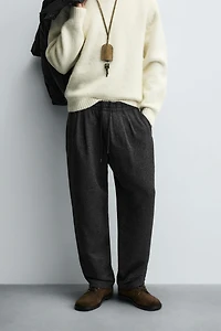 PLEATED WOOL PANTS