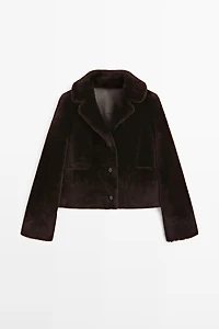 Veste moutonnée courte en peau