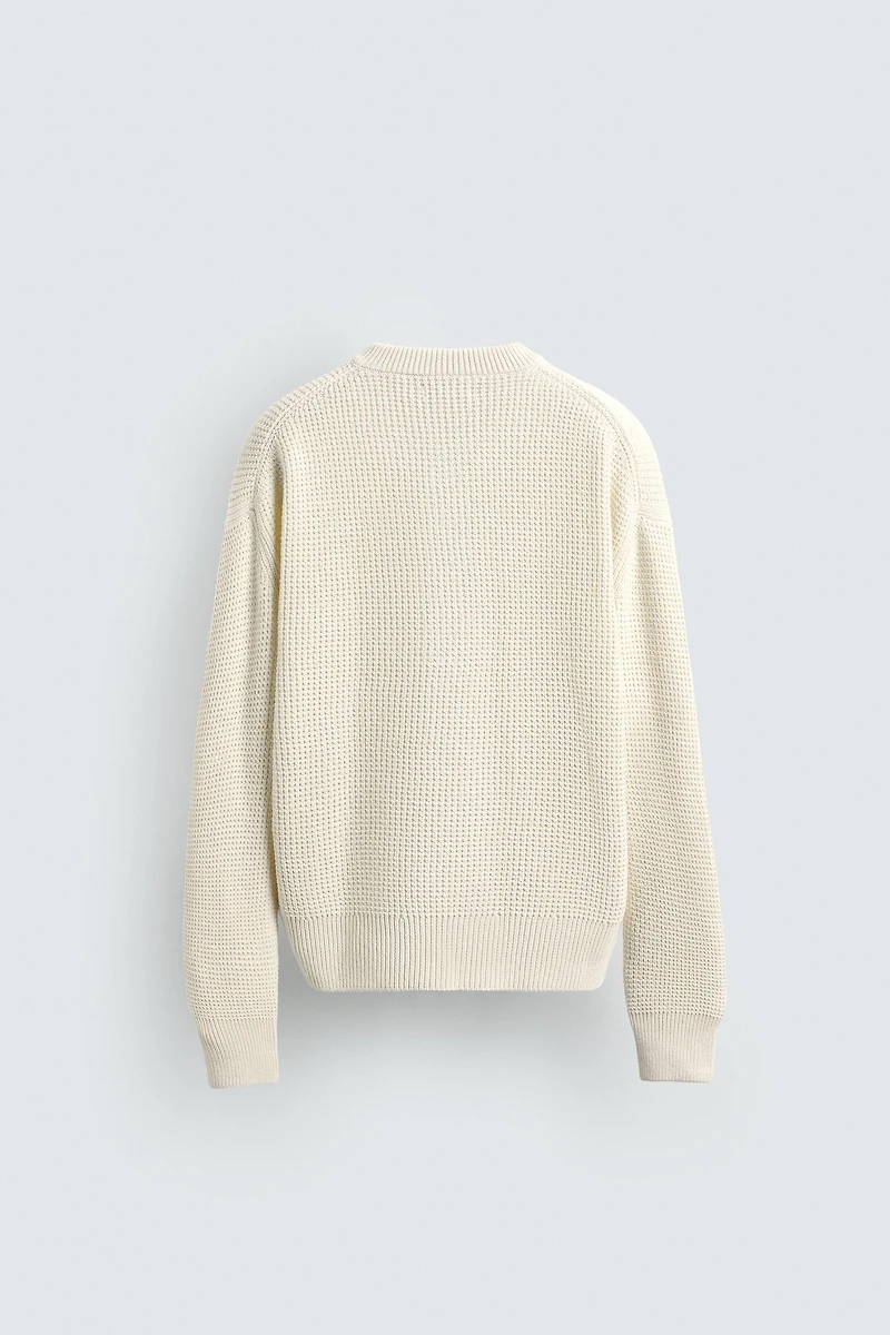 RELAXED FIT BUTTON-NECK SWEATER