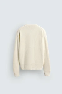 RELAXED FIT BUTTON-NECK SWEATER