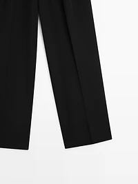 Wide-leg flowing trousers with darts