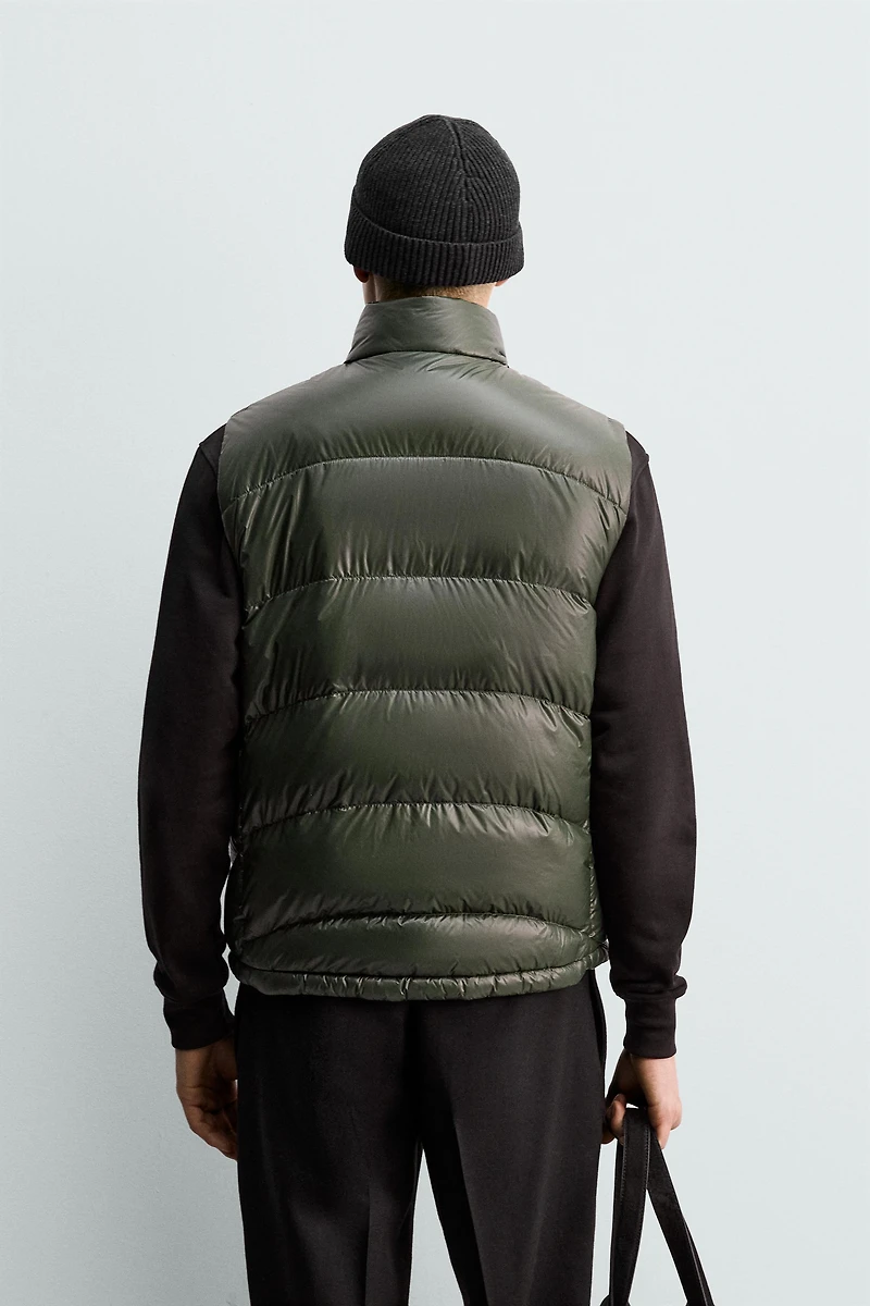 80% DOWN - 20% FEATHER WATER REPELLENT QUILTED VEST ORIGINS