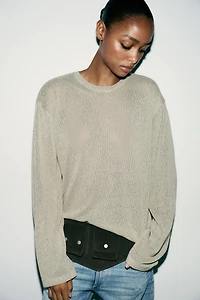 CUT-OUT KNIT SWEATER
