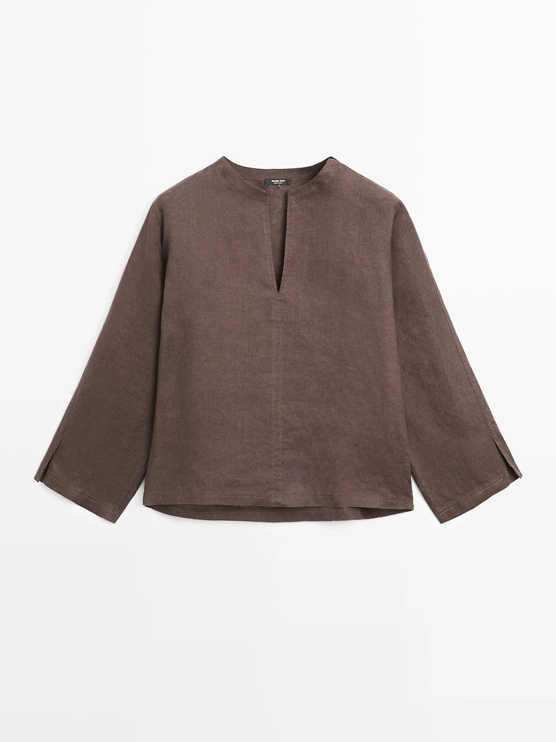 100% linen blouse with topstitching detail