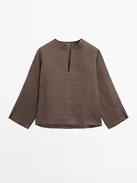 100% linen blouse with topstitching detail