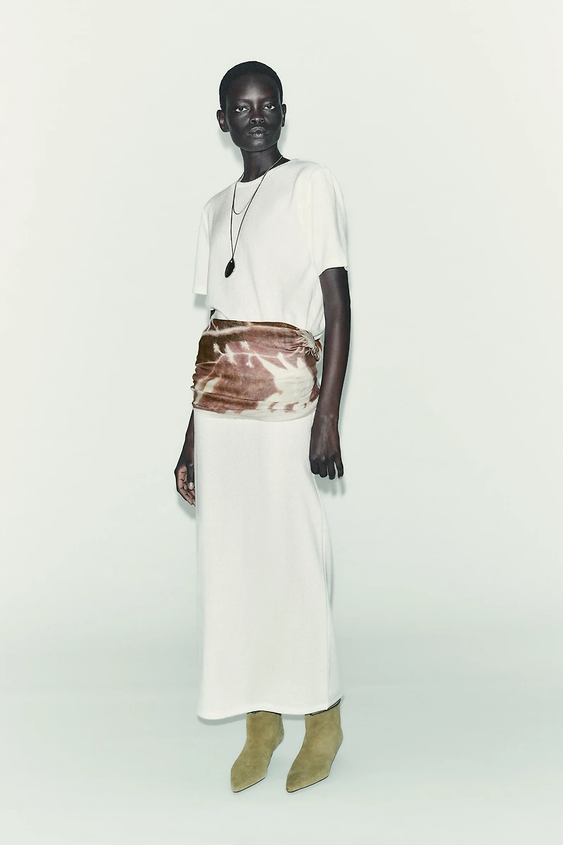 CUT-OUT KNIT MIDI SKIRT