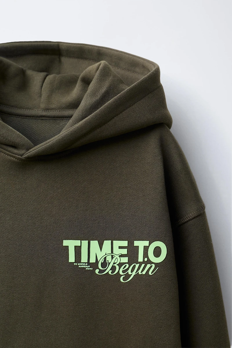 HOODIE WITH EMBOSSED TEXT PRINT