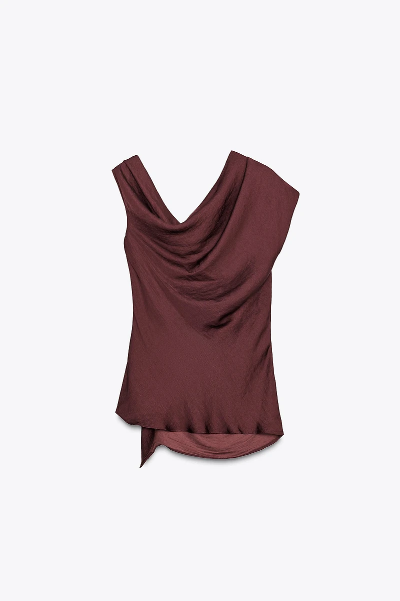 ASYMMETRIC TRIM TOP