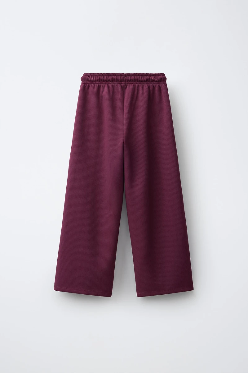 PANTALON DE SPORT À JAMBES LARGES