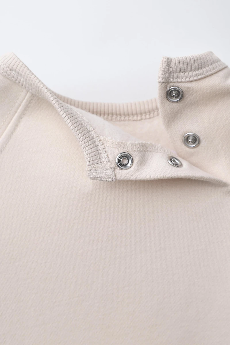 EMBROIDERED BEAR PLUSH JUMPSUIT