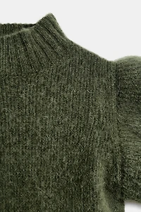 GILET AVEC LAINE ET VOLANTS