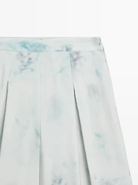 Printed trousers with pleat details