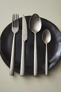 4-PIECE VINTAGE STEEL FLATWARE SET