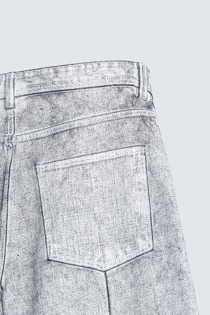 WAXED FINISH BAGGY FIT JEANS