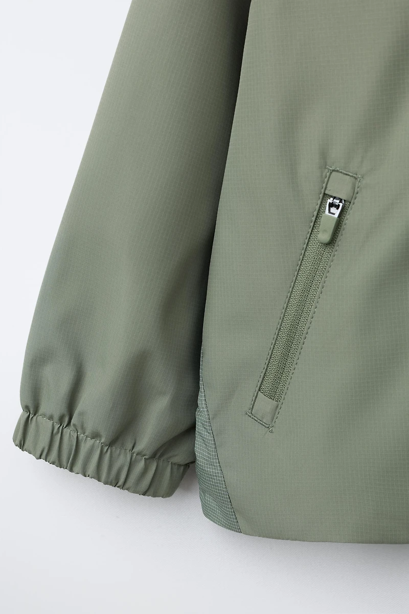 INTERLOCK WATER REPELLENT RAINCOAT