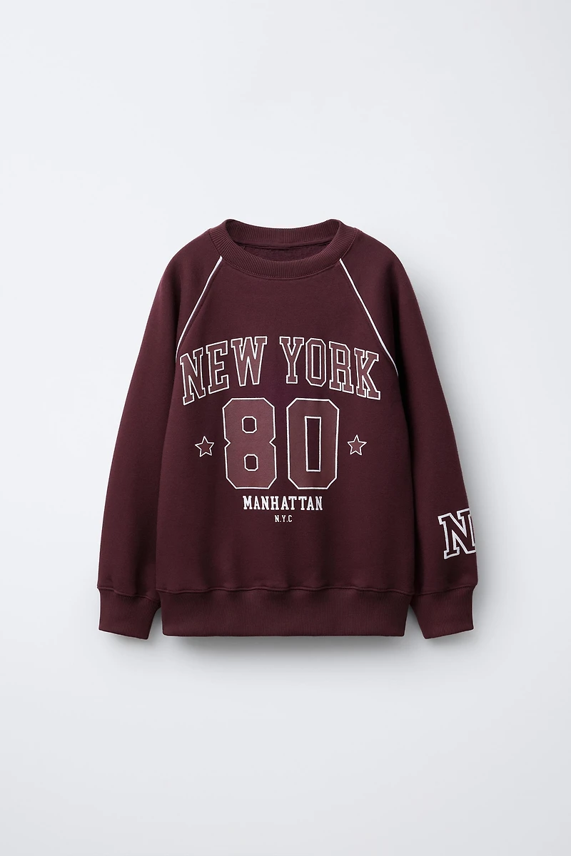 RAGLAN SLEEVE SWEATSHIRT WITH TEXT AND NUMBER