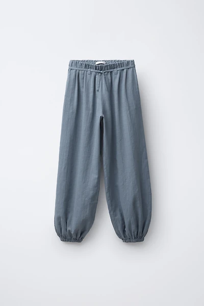 FLOWY PANTS WITH ELASTIC TRIM