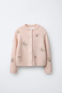 GILET EN MAILLE AVEC FLEURS FANTAISIE