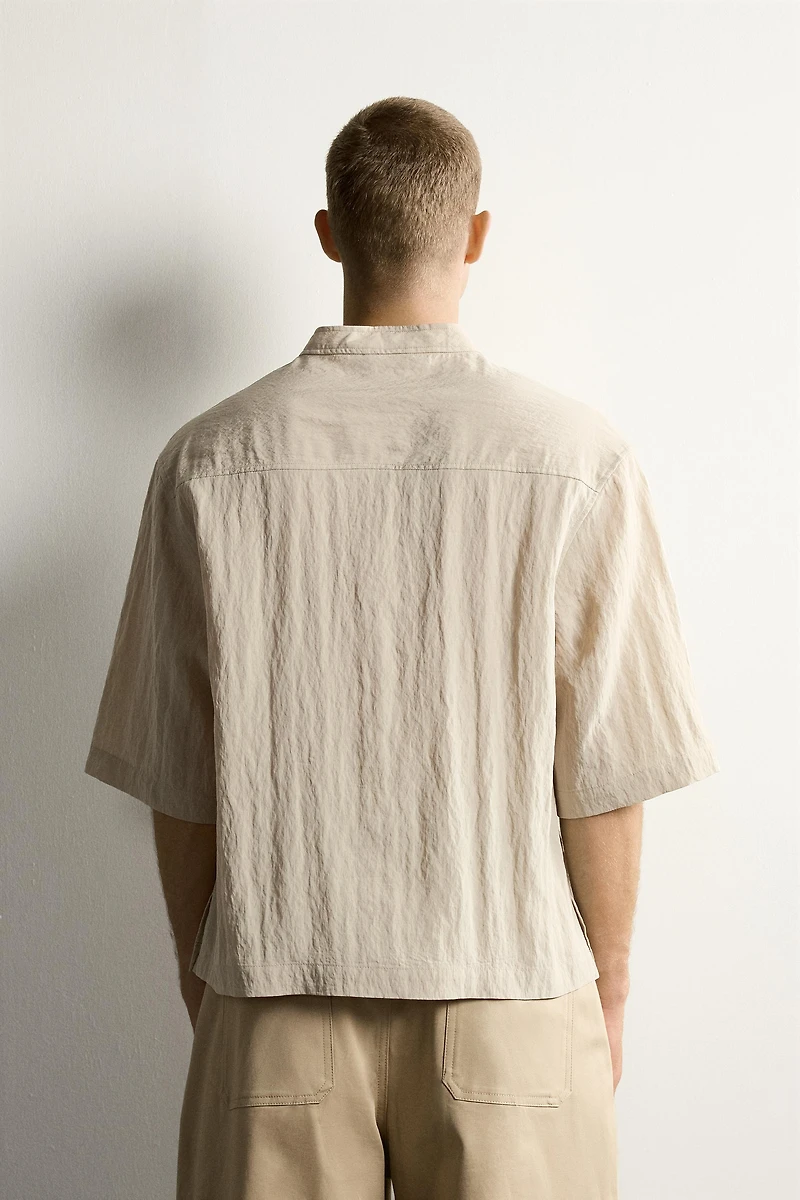 FLOWY POLO SHIRT