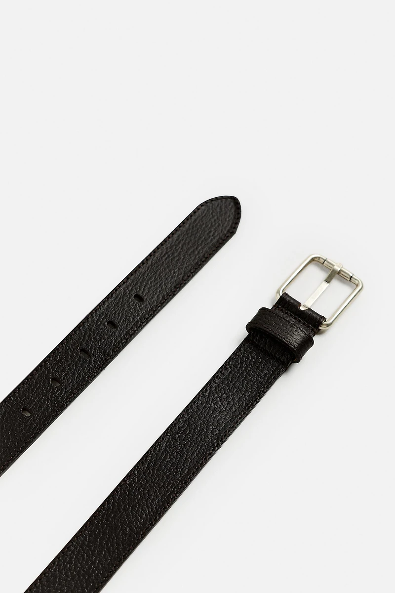 CEINTURE EN CUIR SURPIQUÉE