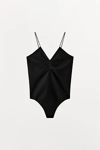 STOCKING-STYLE STRAPPY BODYSUIT