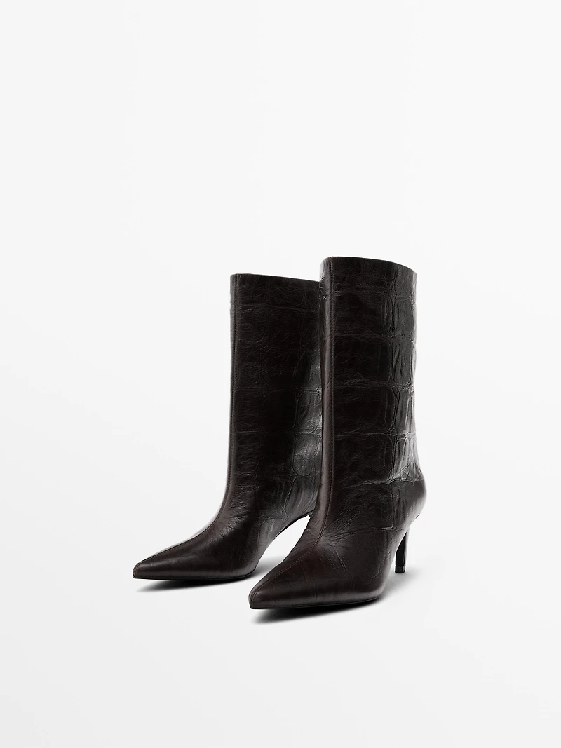 Bottines à talon en cuir grav