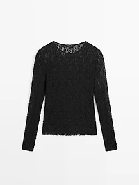 Openwork knit top with long sleeves and lace