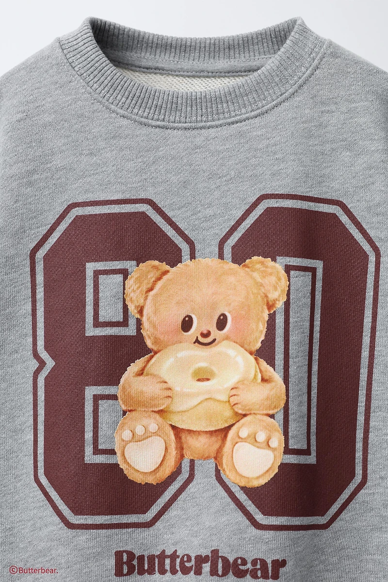 SWEAT À IMPRIMÉ BUTTERBEAR ©
