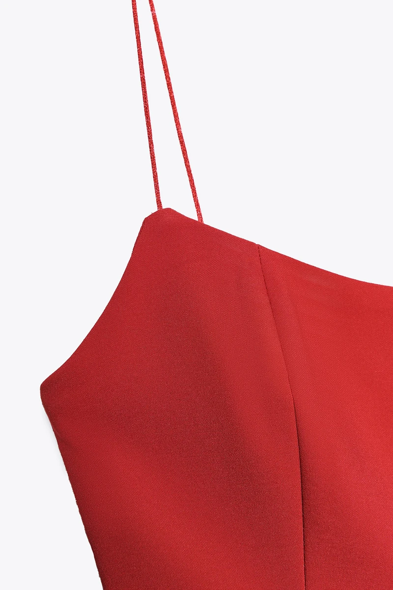 STRETCH PEPLUM TOP