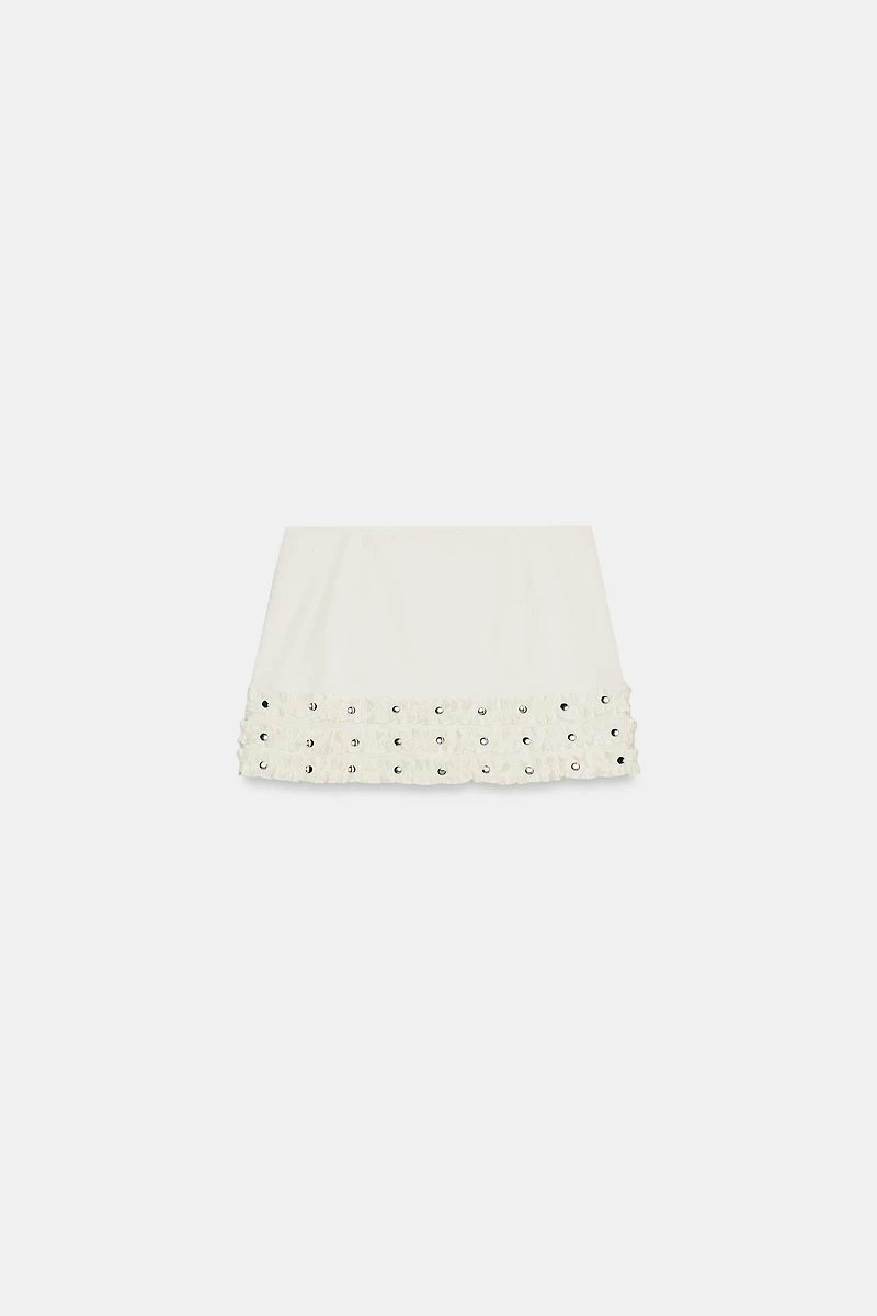 RUFFLED STUDDED MINI SKIRT
