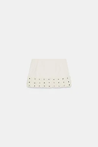 RUFFLED STUDDED MINI SKIRT