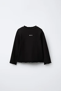 RIBBED TOP WITH EMBROIDERED DETAIL